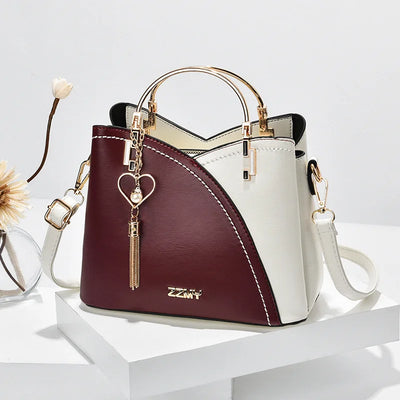 MODÉ BELLE HANDBAG